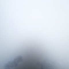 Misty white and gray background with soft focus for atmospheric and dreamy designs