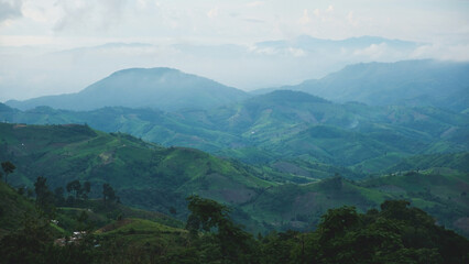 Greenery mountain views on cloudy day