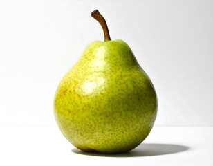 A single green pear stands on a white surface with a slight shadow, simple composition with focus on its texture
