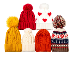 Seven knitted winter hats, each with different patterns & pom-poms, arranged closely