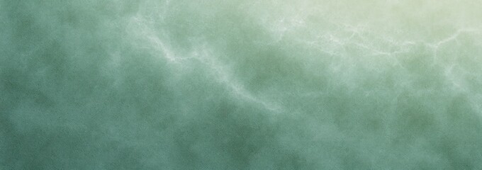 Aerial view of an ocean surface with a gradient of seafoam green and muted teal colors showing gentle waves and light reflections creating a serene mood