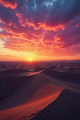 Dramatic desert sunset with vibrant colors casting long shadows on sand dunes. A vast, empty desert landscape with undulating sand dunes at sunset. The sky is a dramatic explosion of vibrant orange,
