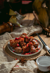 Spicy Duck Necks on Plate Bold Chinese Snack