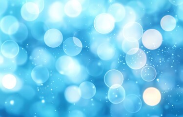 Obraz premium Soft glowing light bubbles and sparkles on a blue background creating a dreamy and peaceful atmosphere