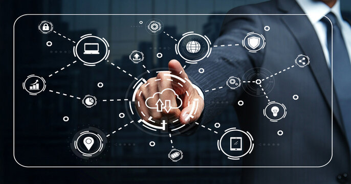 Business Professional Utilizing Digital Interface with Various Tech Icons Representing Connectivity and Data Management in a Modern Office Environment