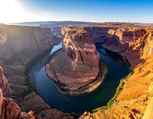 Aerial view of a winding river through a desert canyon