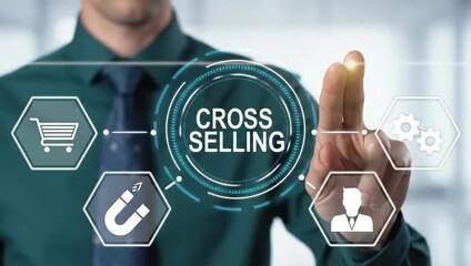 Business person using virtual touch screen presses the words CROSS SELLING. Сross sell marketing tactics