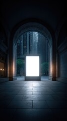 Fototapeta premium Illuminated White Poster Displayed Within An Architectural Archway Facing City Buildings At Night
