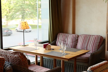Cozy Caf Seating Area with Natural Light and Stylish Decor