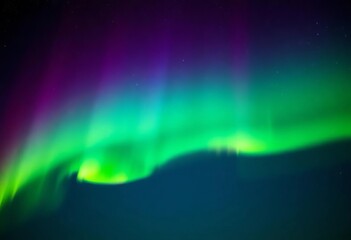 Vibrant green and purple aurora borealis dancing across a star-studded night sky,  atmospheric, Aurora