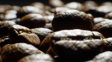 A captivating extreme closeup shot of roasted coffee beans showcasing their rich texture and earthy brown tones perfect for illustrating the essence of fresh coffee and its aromatic qualities. - Powered by Adobe