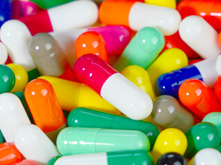 Many multi-colored capsules.