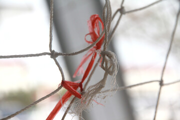 A worn sports net rope.