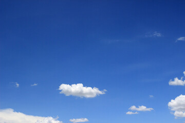 A bright blue sky with beautiful clouds.