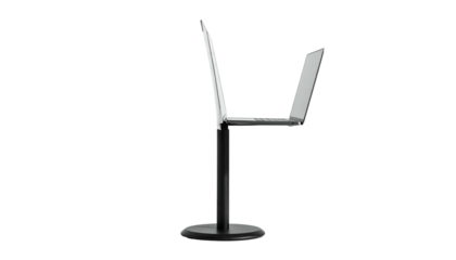 Laptop balanced vertically on stand against a dark background