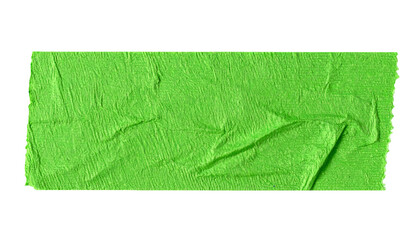 A torn rectangle of bright green, textured tape against a black background