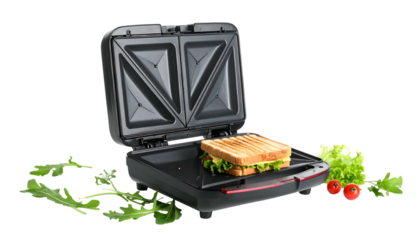 Toasted sandwich in electric grill, surrounded by greenery