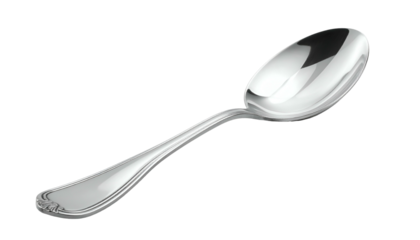 Reflective, shiny silver spoon angled against a stark black background