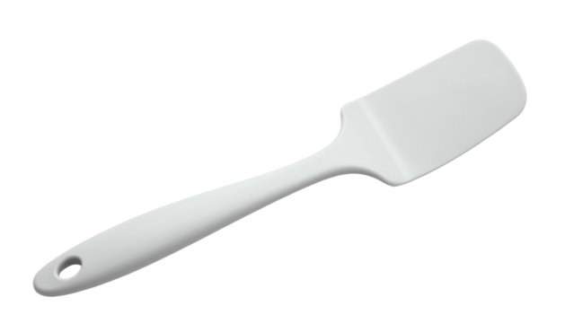 White kitchen spatula, angled, set on dark background
