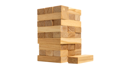 Tower of wooden blocks poised, isolated on black backdrop