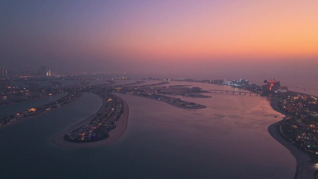 Aerial sunset golden hour view of The Atlantis Royale on Palm Jumeirah Islands in Dubai