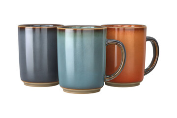 Three ceramic mugs with different color glazes arranged together on a seamless black studio background for your design needs isolated on transparent background