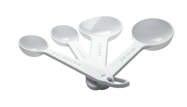 White measuring spoons, plastic, various sizes, nesting