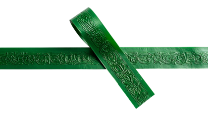 Two emerald green strips, one atop the other, displaying ornate embossed designs on black