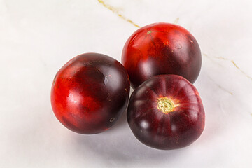 Black ripe juicy organic tomato