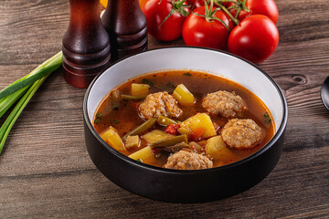 Tomato Soup with meatballs and vegetables
