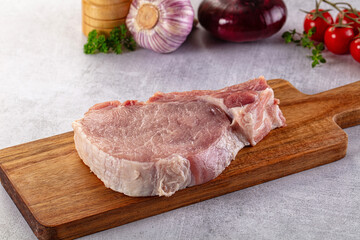 Raw pork steak with bone