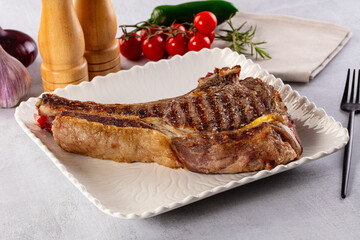 Grilled ribeye beef steak with bone