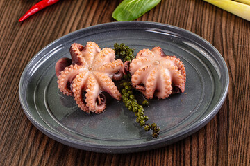 Gourmet Boiled octopus in the bowl © Andrei Starostin