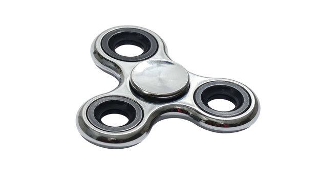 Silver fidget spinner with three black circles against black background