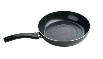 Clean, empty black nonstick skillet with dark handle on dark background
