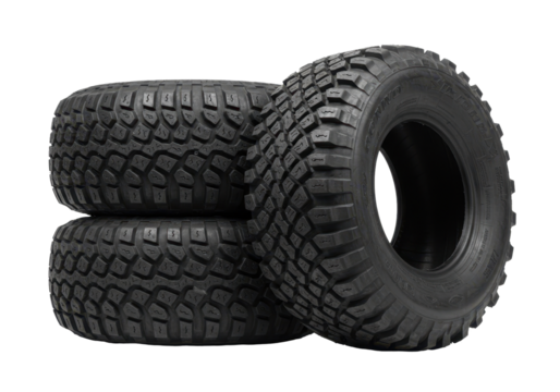 Isolated stack of new off-road tires for SUVs and trucks stacked in a neat pile near one another - Powered by Adobe