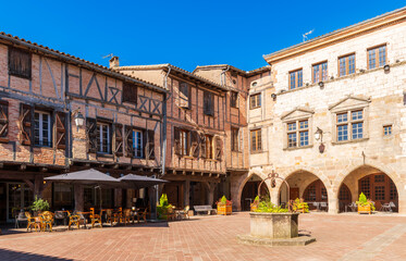 Arcade square in the medieval village of Castelnau de Montmiral in the Tarn in Occitanie, France