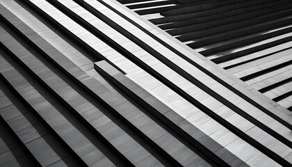 Abstract architectural detail featuring parallel lines and geometric patterns in shades of gray, creating a modern and structured composition.