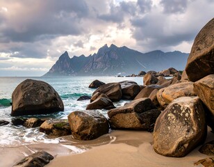 Rocky coastline with sea, mountains, and dramatic cloudy sky