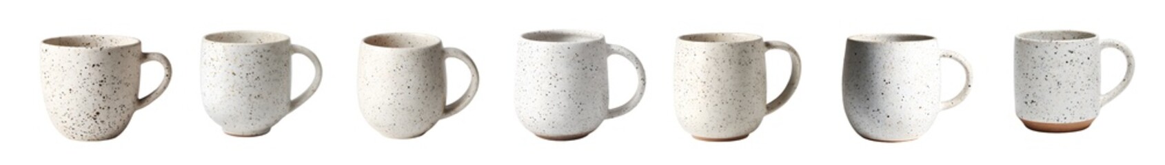 A collection of various ceramic mugs for coffee and tea isolated on a white background.