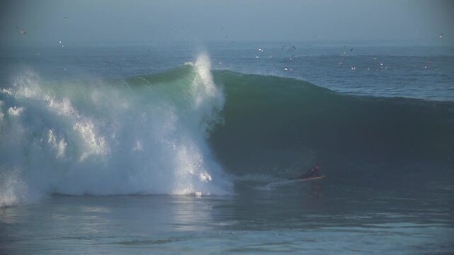Bodyboarder getting closeout barrel wave