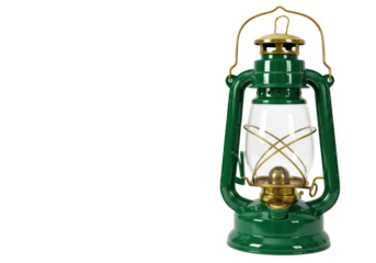 Isolated green kerosene lantern with brass fittings, oil lamp for outdoors and camping