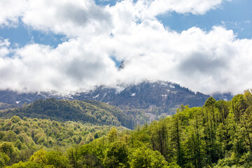 Mountain range with a cloudy sky