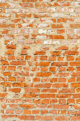 A brick wall with a white line in the middle
