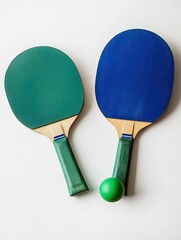 Two ping-pong paddles and a ball, vibrant teal and royal blue, on white background