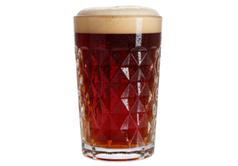 Isolated pint of reddish-brown beer with a thick frothy head and a diamond-patterned glass