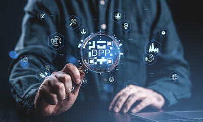 Digital product passport DPP concept with hologram icons and magnifying glass in hand over dark background, showcasing supply chain technology interface.