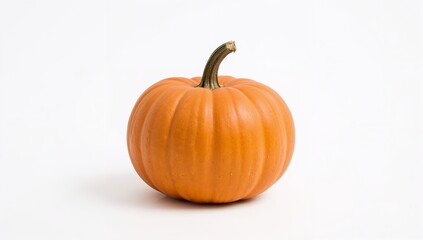 Obraz premium Whole pumpkin isolated on white background with natural shape and realistic shadow. Ideal for autumn, Halloween, and healthy harvest visuals.