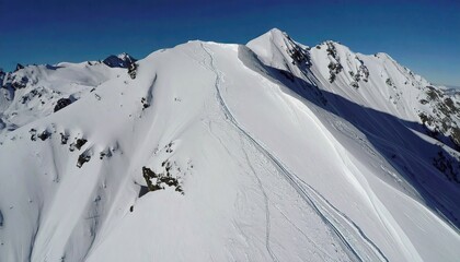 Aerial View of Snow Covered Mountain Ridge