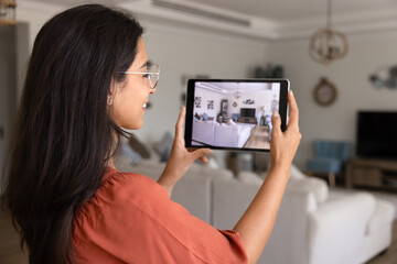 Landlady making virtual tour, video presentation for rent advertising